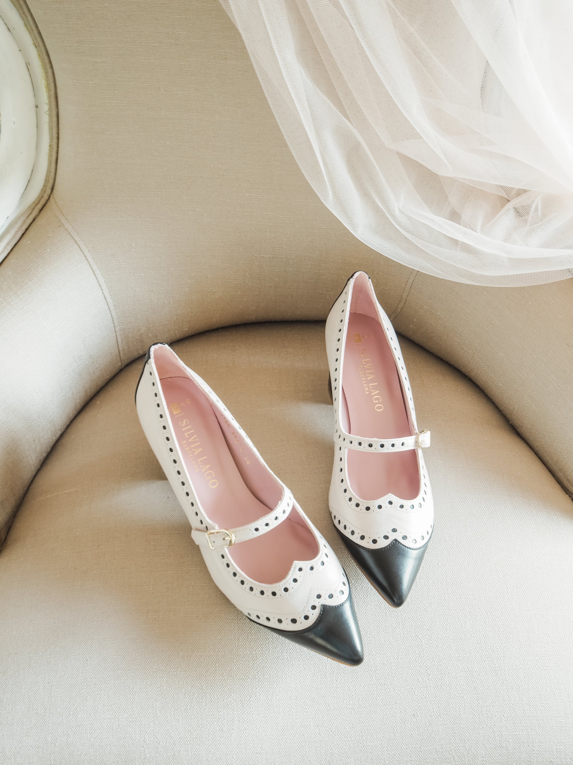 Edith pumps 50mm black and ivory calf